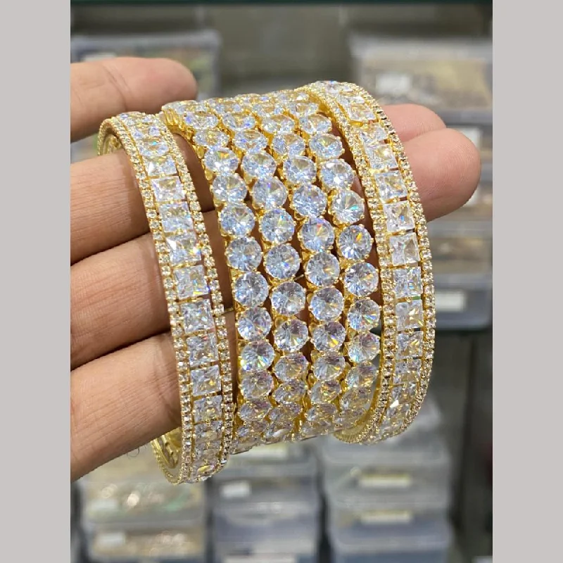 Boho-style bangles for free-spirited fashion-Hira Collections Gold Plated American Diamond Bangles Set