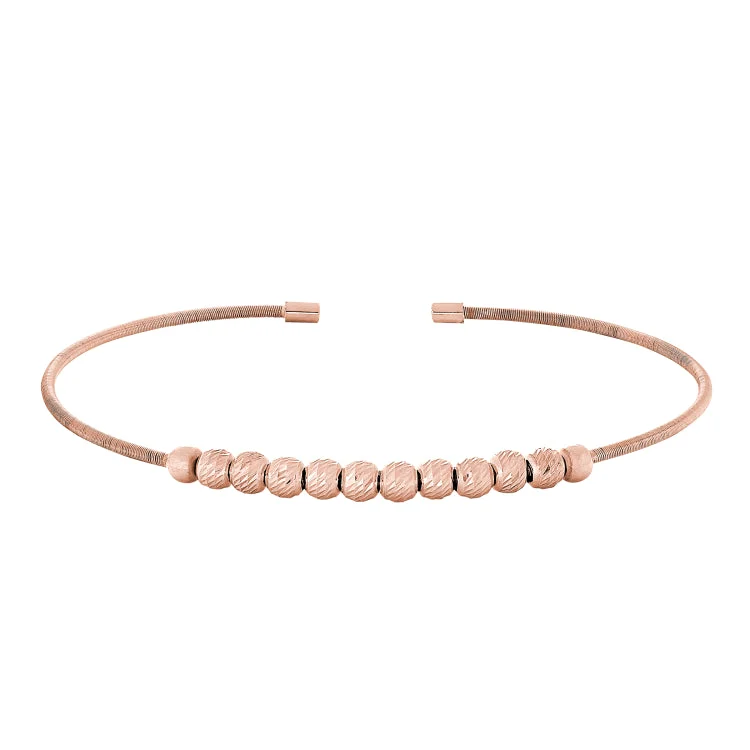 Engraved sterling silver bracelets for thoughtful gifts-Rose Gold Finish Sterling Silver Cable Cuff Bracelet with Ten Diamond Cut Spinning Beads