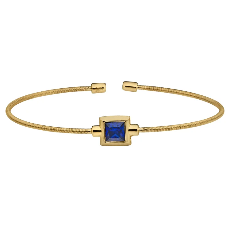 Hand-stamped bracelets for meaningful designs-Gold Finish Sterling Silver Cable Cuff Bracelet with Princess Cut Simulated Sapphire Birth Gem