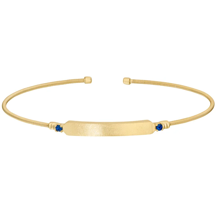 Beaded stretch bracelets for easy wear-Gold Finish Sterling Silver Cable Cuff Bracelet with Name Plate and Simulated Blue Sapphire Birth Gems - September