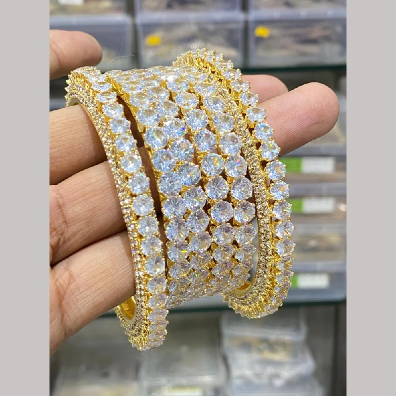 Gemstone bangles for colorful fashion-Hira Collections Gold Plated American Diamond Bangles Set